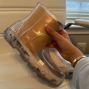 Ugg clear boots, size 8, no tag, never worn.